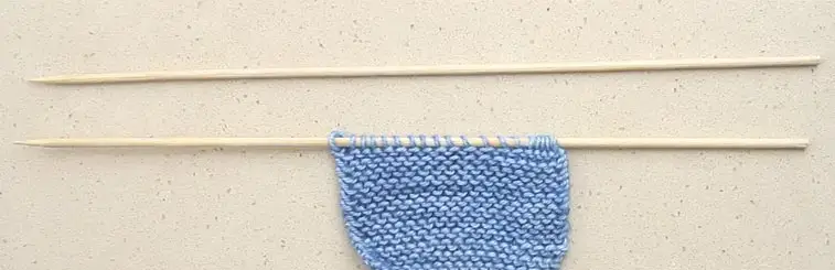 knitting with kebab skewers to save money