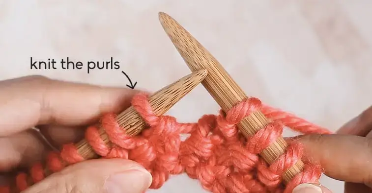 hands holding knitting