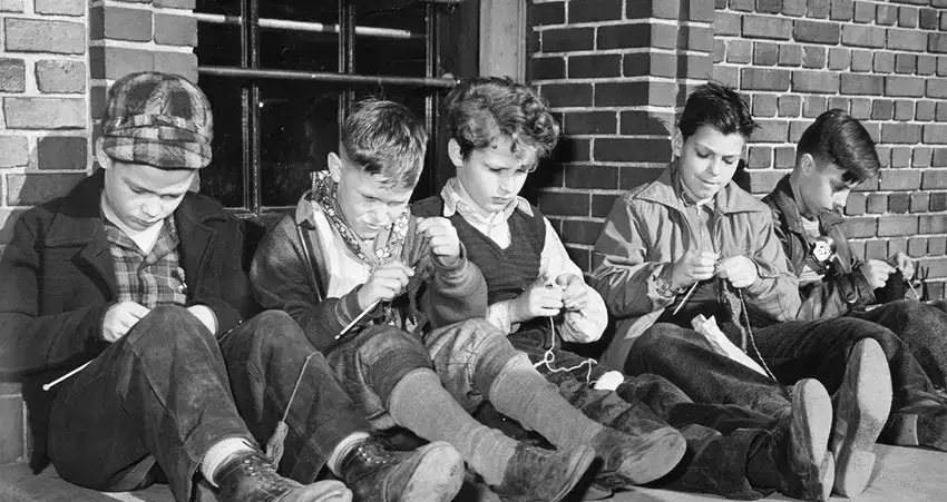 boys knitting together