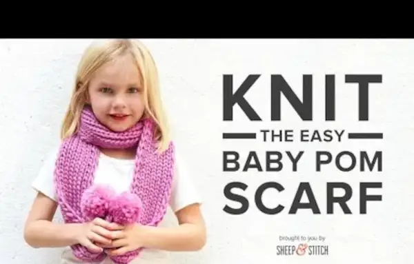 Le modèle d'écharpe bébé pompon