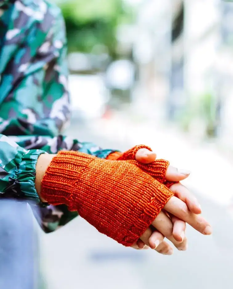 orange fingerless gloves