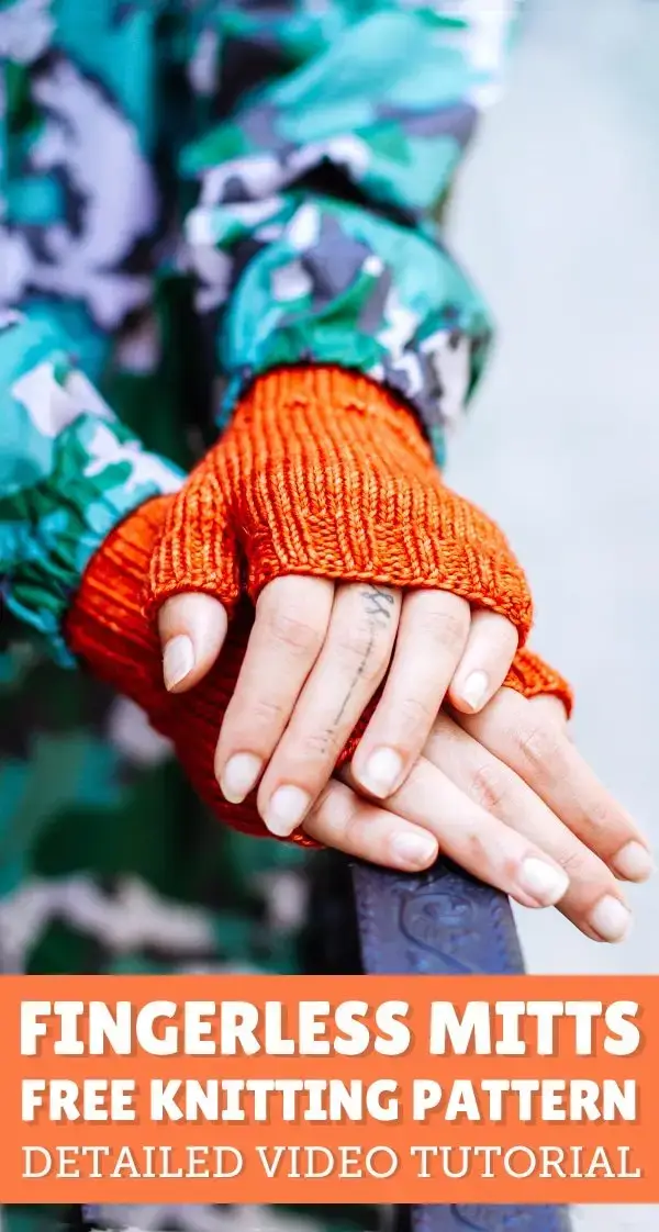 A pair of orange fingerless mittens